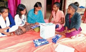 Kishori Samooh members during a discussion on a pad bank.