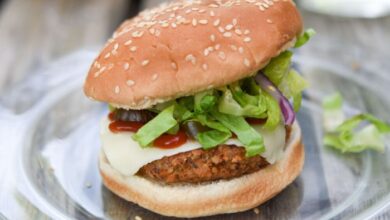 Toasted sesame garbanzo bean burgers with red onion straws