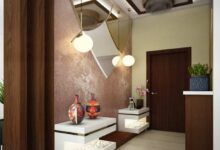 Entryway decor and wallpapered ceiling