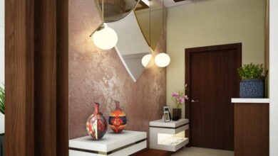 Entryway decor and wallpapered ceiling