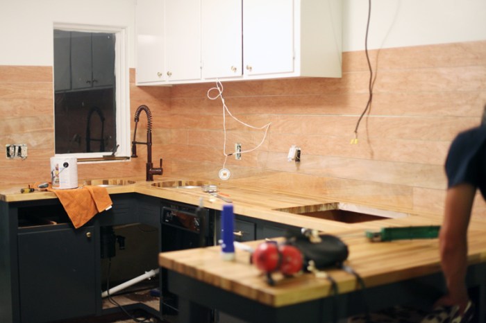 Cabinets backsplash make existing kitchen inexpensive plank reconfiguring fresh abeautifulmess look shelf around put shelves ceiling wood tiles remodel cupboards