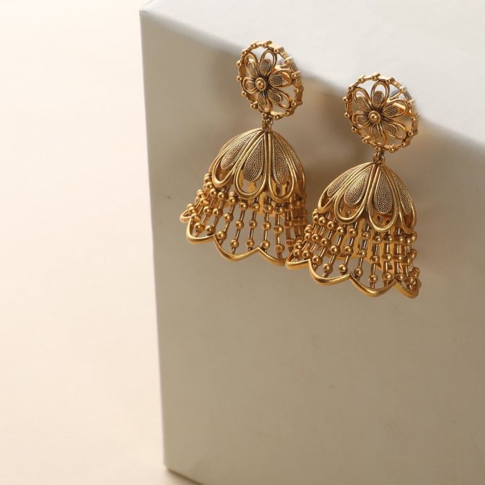 Make these glittery gold thunderbolt earrings