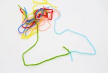 Have a sweater make a pom pom hat