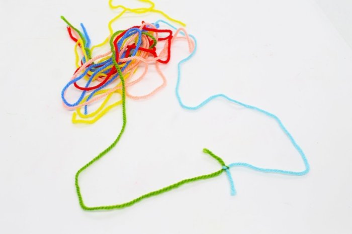 Have a sweater make a pom pom hat