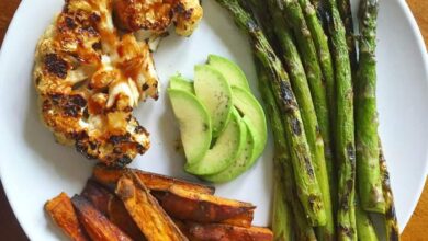 Smoky cauliflower steaks with orange and herb quinoa