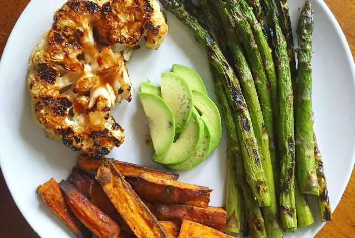 Smoky cauliflower steaks with orange and herb quinoa